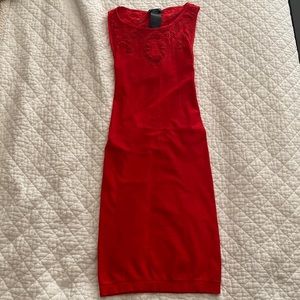 Bebe red mini dress. Open back! Spandex & polyester blend. Size small.
